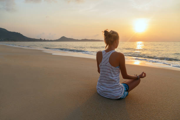 istock Practices  yoga in sunsrise 658538362