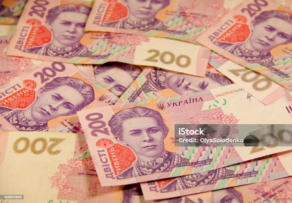 Dinero ucraniano. Antecedentes de los doscientos billetes hryvnia - Foto de stock de Abundancia libre de derechos