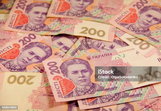 Dinero Ucraniano Antecedentes De Los Doscientos Billetes Hryvnia Foto de stock y más banco de imágenes de Abundancia