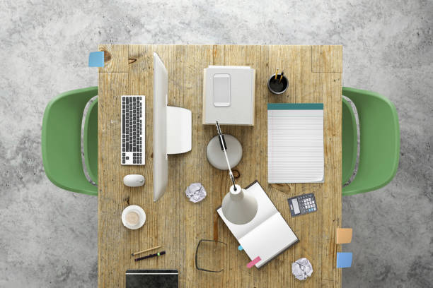 istock Business knolling office desk view with two green chairs 658548800