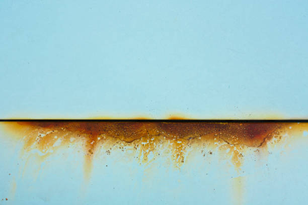 Baby blue metal with rusty cut Baby blue metal with rusty orange cut, a detail of an old car rust colored stock pictures, royalty-free photos & images