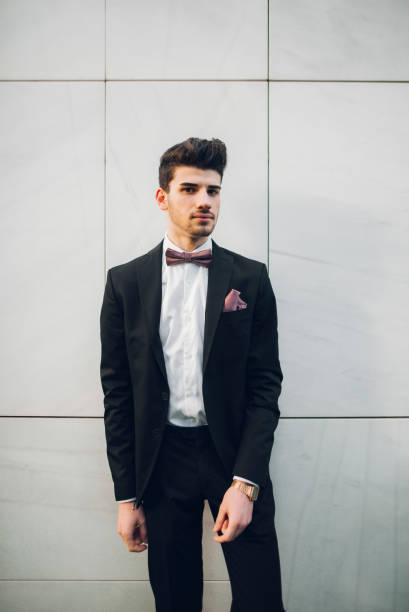 istock Young man wearing a suit 658550784