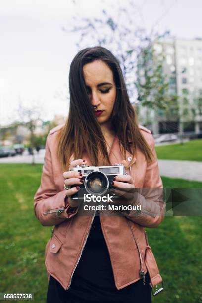 Young Woman Using A Vintage Camera Stock Photo - Download Image Now - Adolescence, Adult, Adults Only