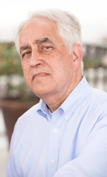 istock Senior adult man at outdoor cafe. 658564100