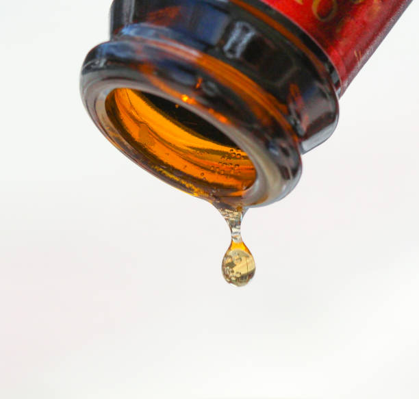 istock pouring last drop of a beer into a glass, 658564242