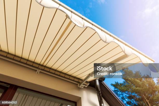 Awning Over Balcony Window Against Blue Sky Stock Photo - Download Image Now - Awning, Patio, Shade