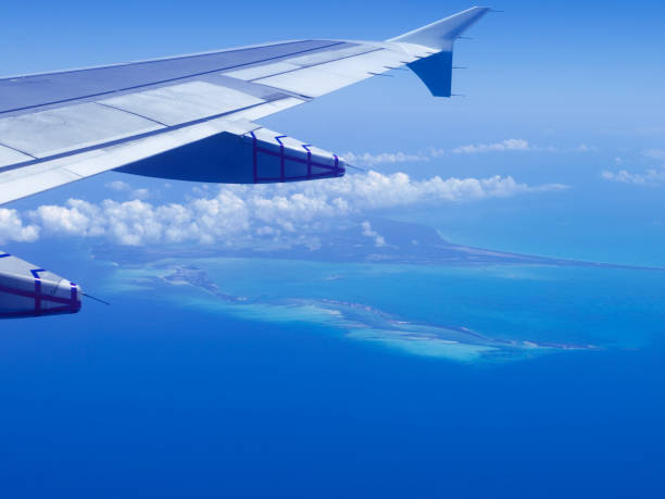istock View of a tropical island from the airplane window 658564478