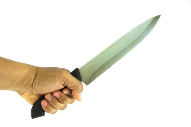 istock Human hand hold the knife on white background 658564748