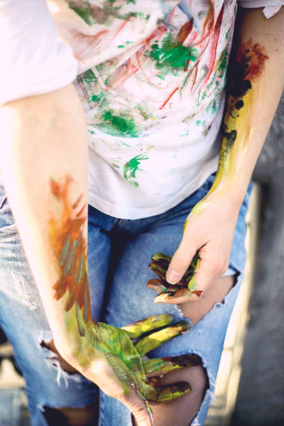 istock Young woman have a fun with colors 658564854