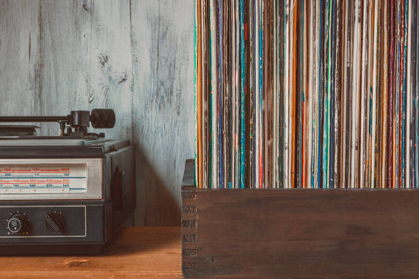 istock Old vinyl records and turntable 658571106