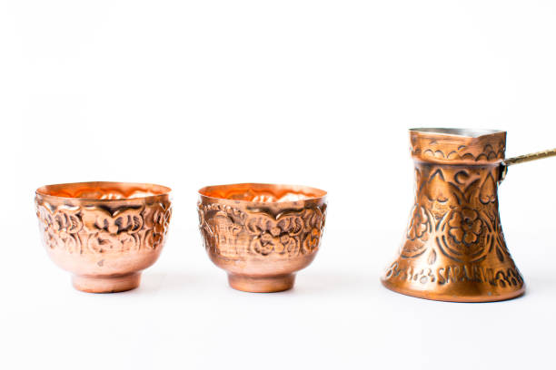 istock copper coffee pot and cups isolated 658572104