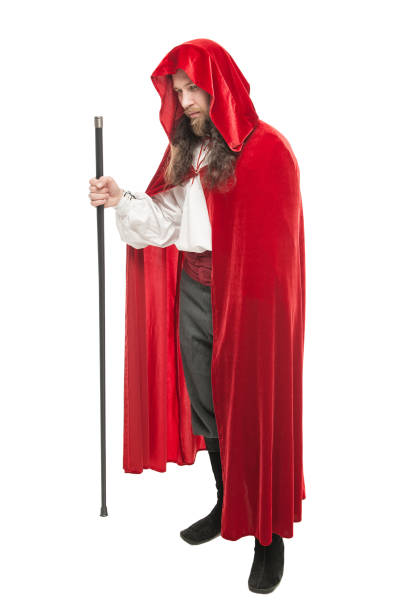 istock Medieval man in cape with cane isolated 658577862