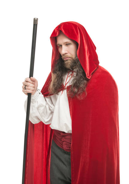 istock Medieval man in cape with cane isolated 658577932