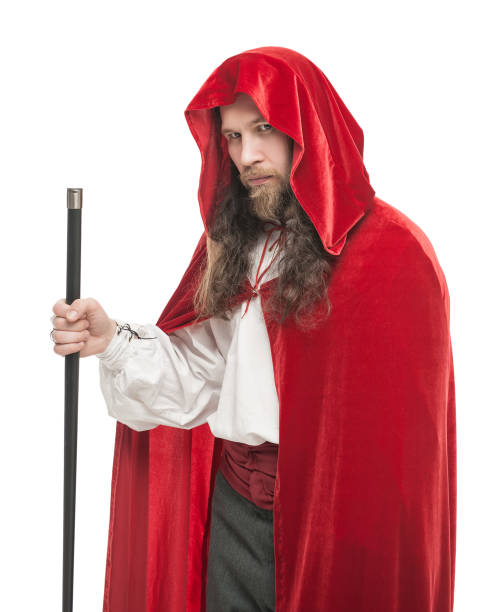 istock Medieval man in cape with cane isolated 658577986