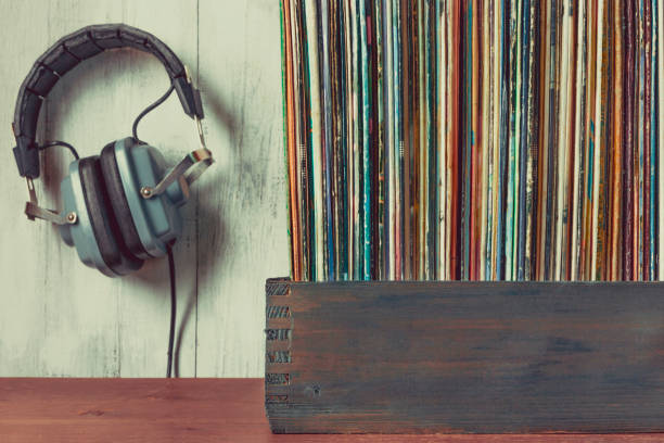 istock Old vinyl records and headphones 658578994