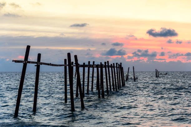 Old bridge in the sea stock photo