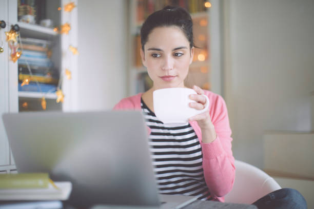 istock Young woman at home 658580146