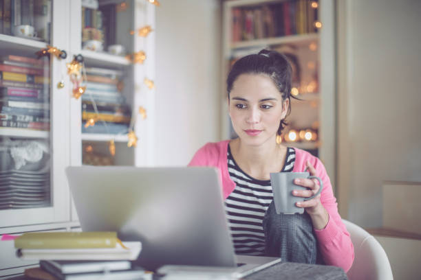 istock Young woman at home 658580574