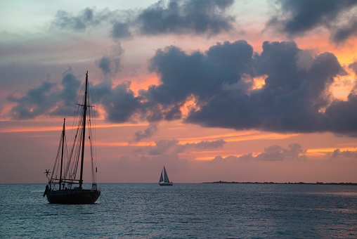 View of the sailboats in the Caribbean sea at sunset on Bonaire, Dutch Caribbean