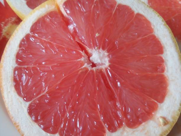 istock The clove of red grapefruit on the plate 658587710