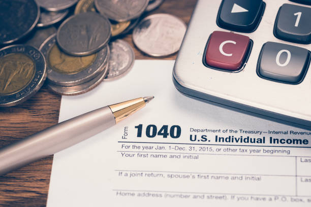 istock U.S. tax form 1040 with pen 658588104