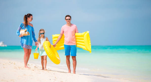 istock Young family enjoy beach vacation 658588808