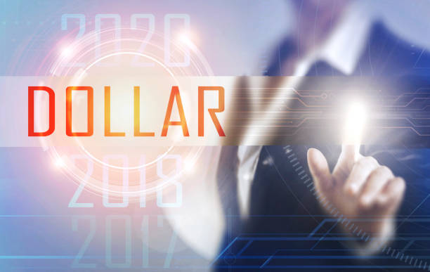 istock Business women touching the dollar screen 658596448