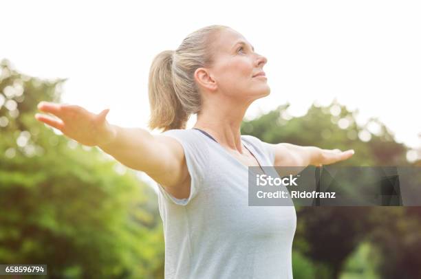 Mature Woman Yoga Exercise Stock Photo - Download Image Now - Women, One Woman Only, Yoga
