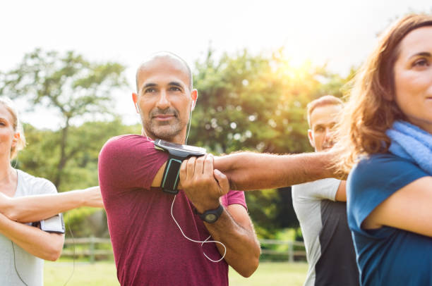 istock Healthy mature man stretching arm 658600028