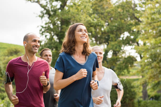 istock Woman running with friends 658600294