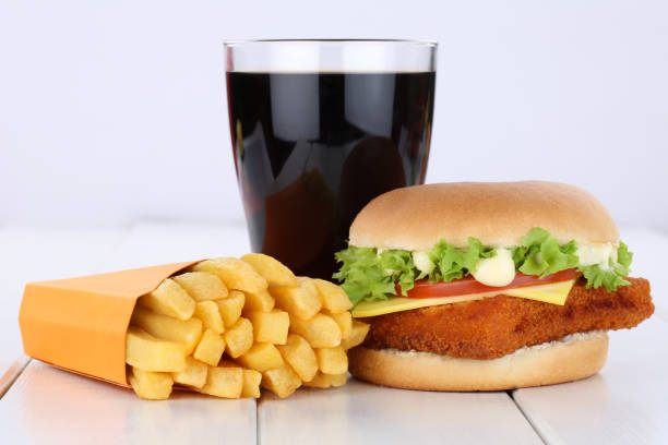 istock Fish burger fishburger hamburger and fries menu meal combo cola 658600500