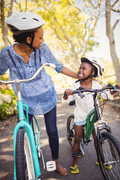 istock Happy family doing bicycle 658605084