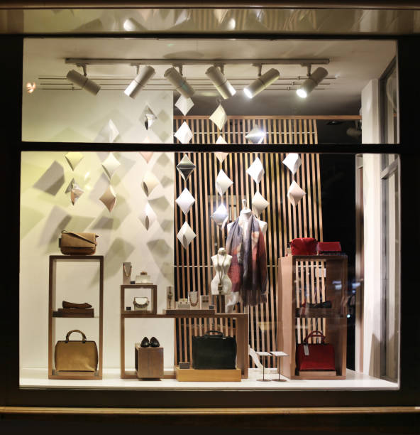 istock Window with mannequin and accessories. Night light. 658609048