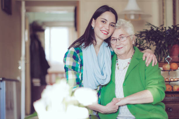 istock Social worker is visiting a senior woman 658609310