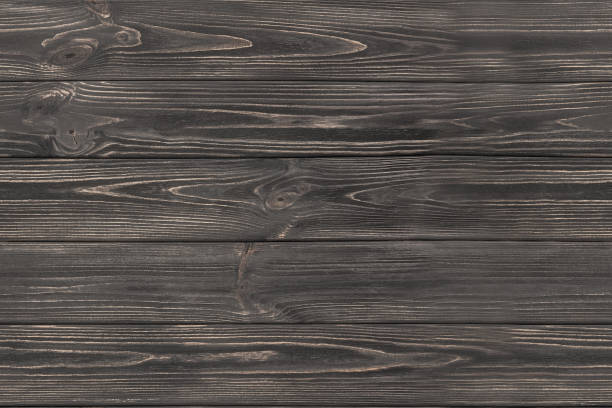 Seamless dark grey wooden background