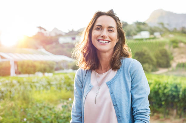 Laughing woman in park