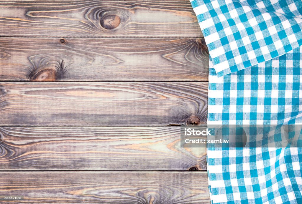 White old wooden table with blue checkered tablecloth, top view with copy space Picnic Table Stock Photo