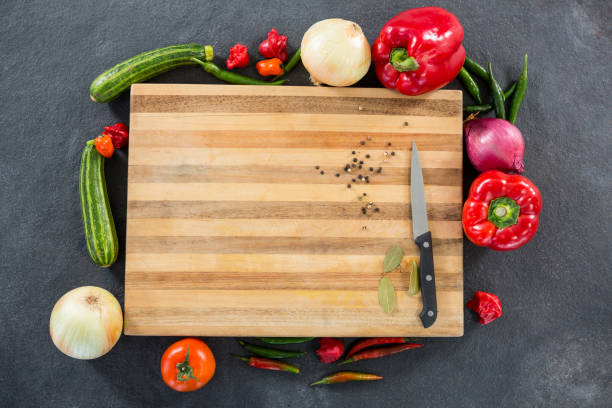 istock Vegetables around wooden board 658625686