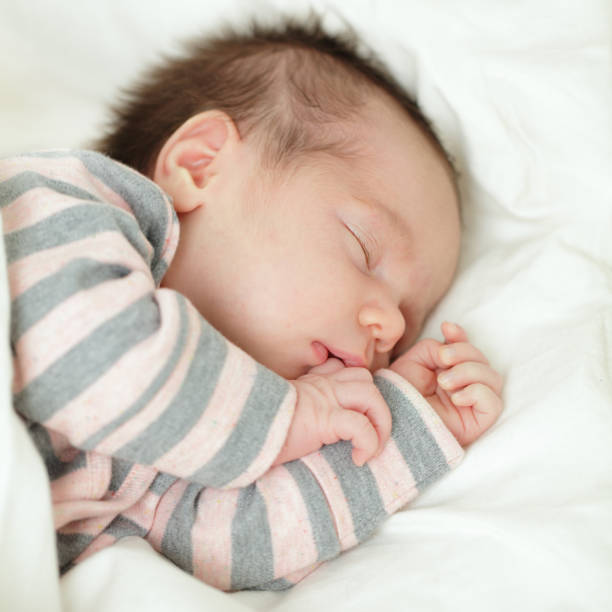 istock Baby close-up, sleeping newborn, background 658625854