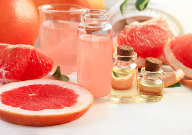 istock Bottles of pink grapefruit juicy essential oil. 658627994