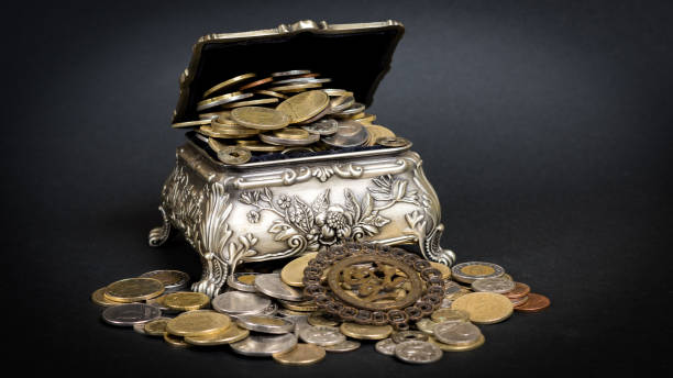 istock Treasure chest filled up with coins 658638612