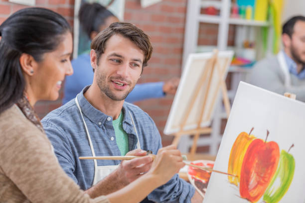 istock Hispanic woman takes an art class 658645982