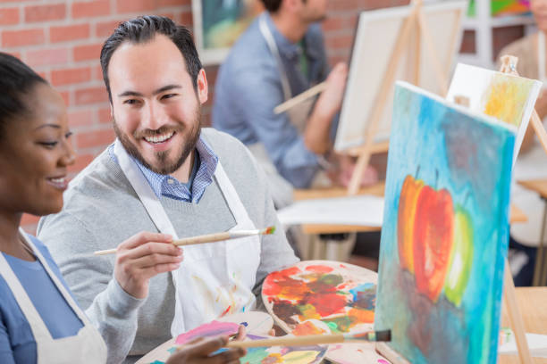 istock Couple takes art class together 658645984