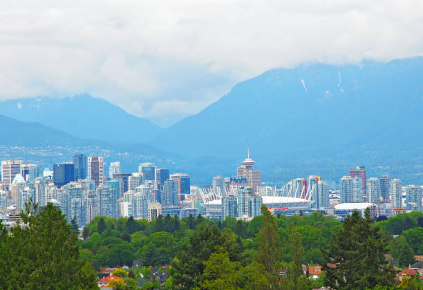 istock Beautiful Vancouver skyline against mountain backdrop 658646344