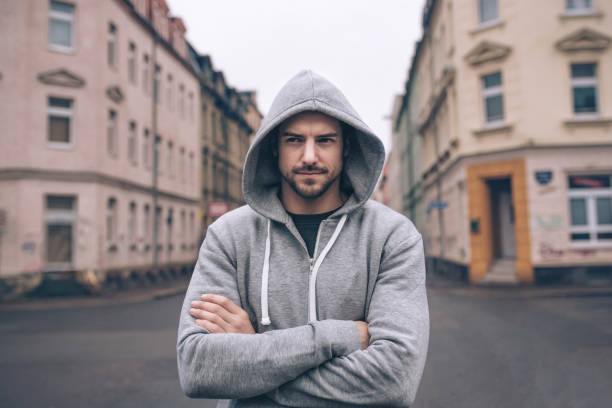 portrait of young man in hoody in city streets young sportsman, break, handsome, beauty, sports, health,  running, city , winter, MAN WEAR Hoodie stock pictures, royalty-free photos & images