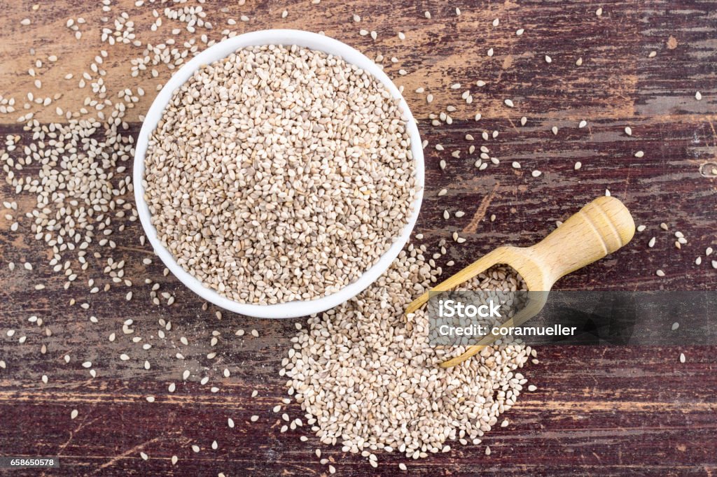 sesame seeds Porcelain dish with sesame seeds Sesame Seed Stock Photo