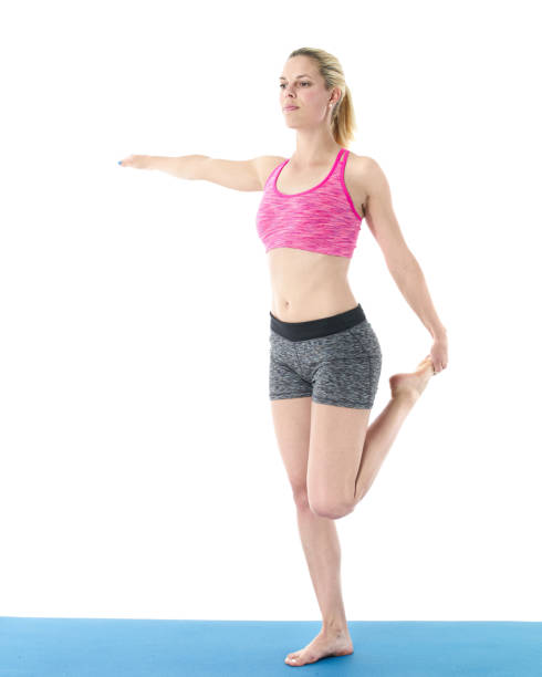 istock Woman making pilates mat exercises 658653466