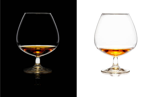 istock Glasses of whiskey over black and white isolated 658653674