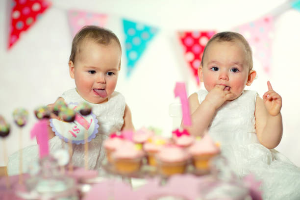 Beautiful Happy Twins Baby On First Birthday Background Stock Photo - Download Image Now - iStock Beautiful Happy Twins Baby On First Birthday Background Stock Photo - Download Image Now - iStock