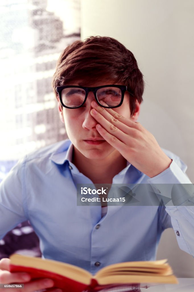 fatigue Young man is tired Austria Stock Photo